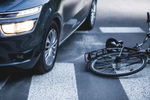 Bicycle hit by a car showing how comparative negligence may affect liability.