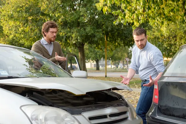 Two People Fighting Over Car Accident - Who Is At Fault In a Car Accident