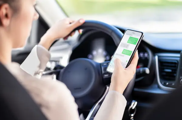 Woman On Phone While Driving