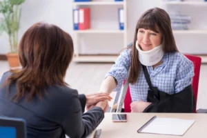 Lawyer speaking with a hit-and-run accident victim about legal options in North Carolina.